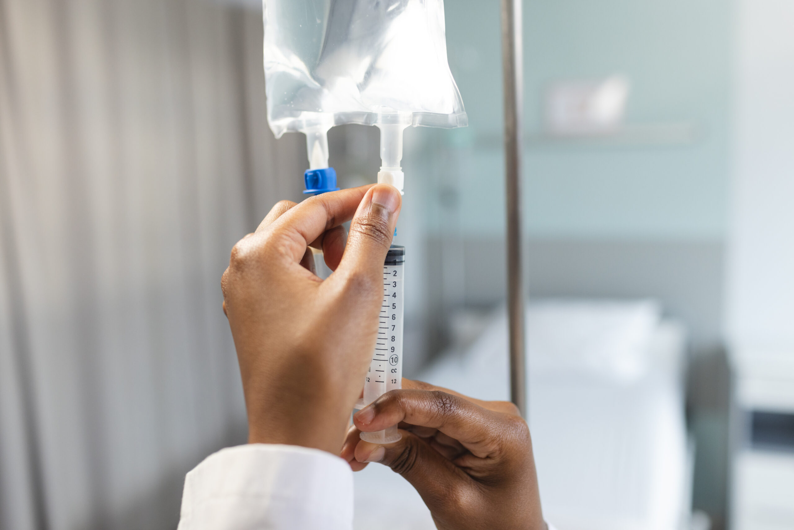 IV therapy drip administration by medical professional